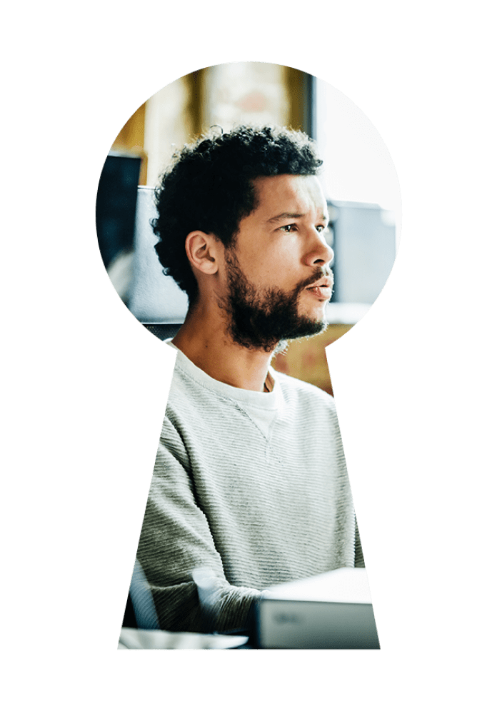 African American man working at computer