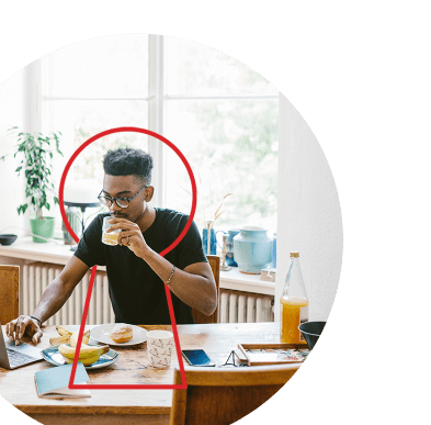 African American man working at his laptop at home