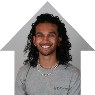 Close-up of Realtor.com employee Taqi smiling