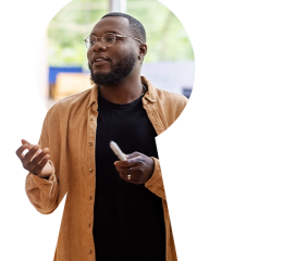 African American man holding marker and presenting ideas